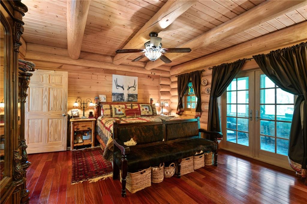 103 Twin Lakes Road Blue Ridge, GA 30513 - Photo 27 of 71 a living room with furniture and wooden floors