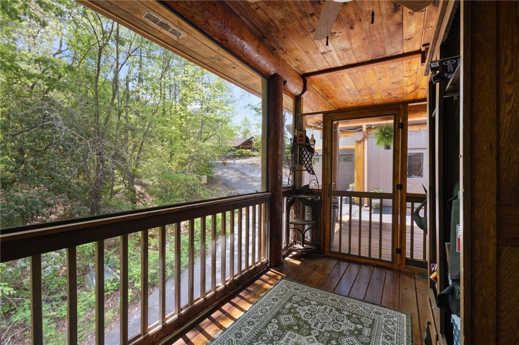 103 Twin Lakes Road Blue Ridge, GA 30513 - Photo 34 of 71 a view of a balcony with wooden floor