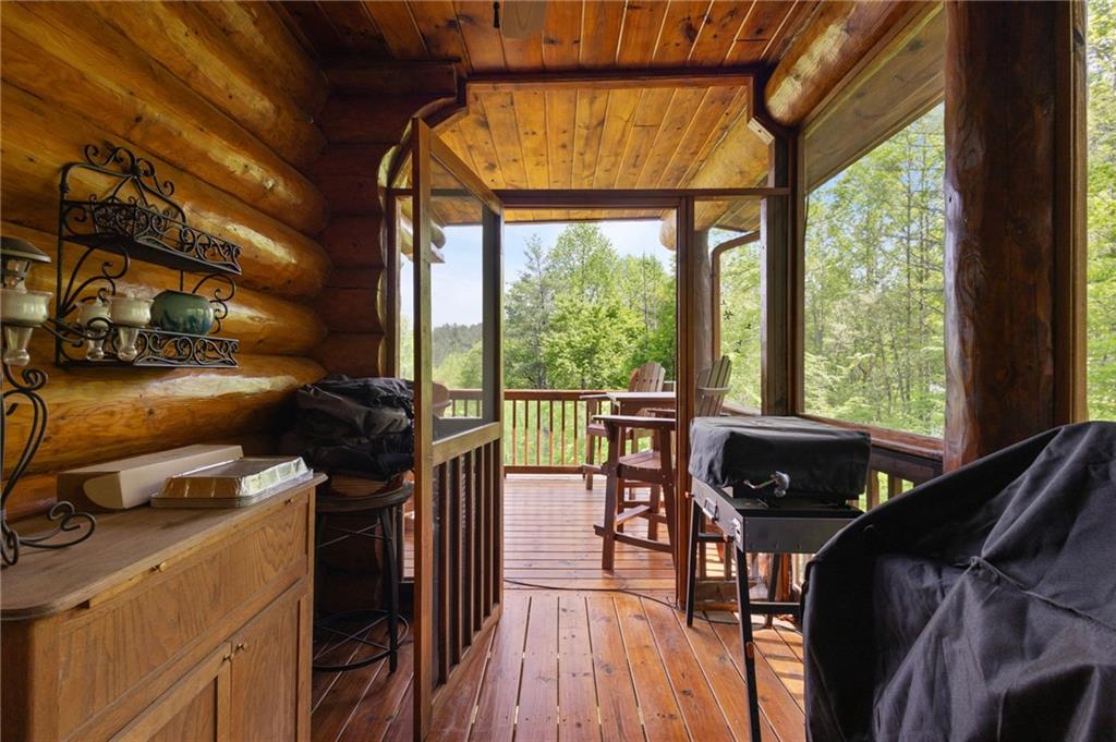 103 Twin Lakes Road Blue Ridge, GA 30513 - Photo 35 of 71 a view of a dining room with furniture window and outside view