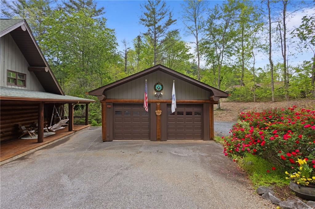 103 Twin Lakes Road Blue Ridge, GA 30513 - Photo 57 of 71 a view of a house with a yard