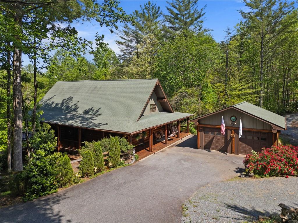 103 Twin Lakes Road Blue Ridge, GA 30513 - Photo 62 of 71 front view of a house with a yard