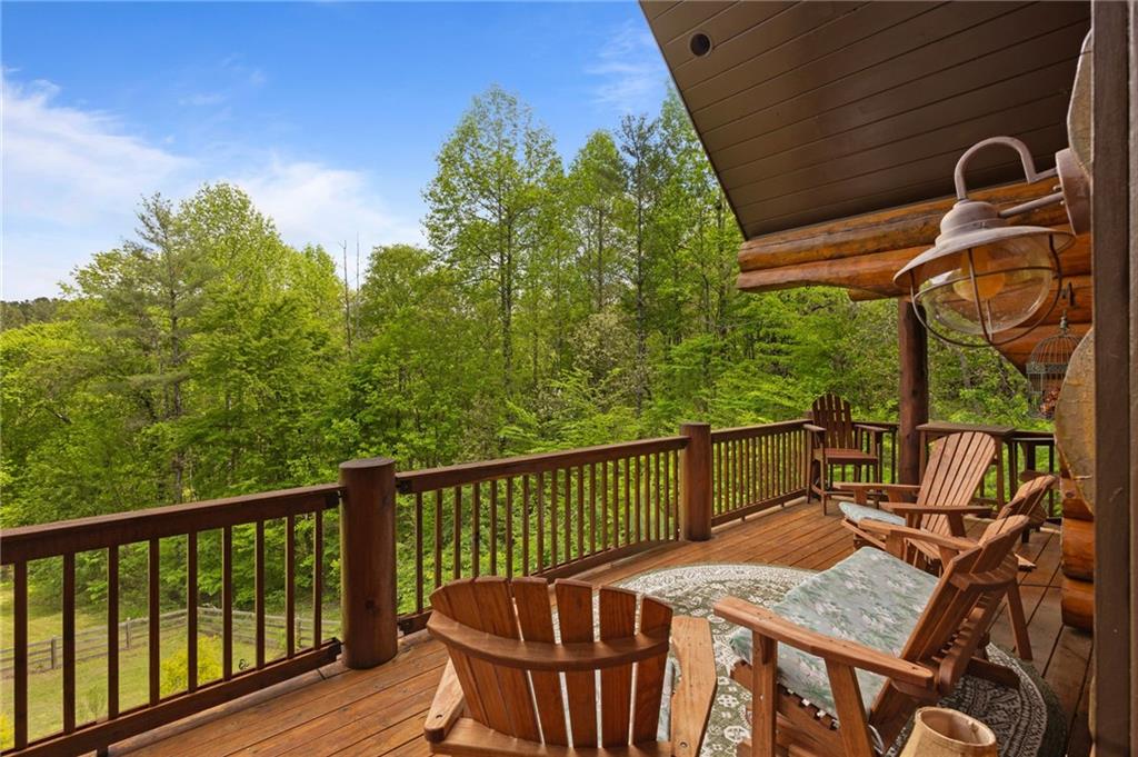 103 Twin Lakes Road Blue Ridge, GA 30513 - Photo 9 of 71 a view of a balcony with furniture