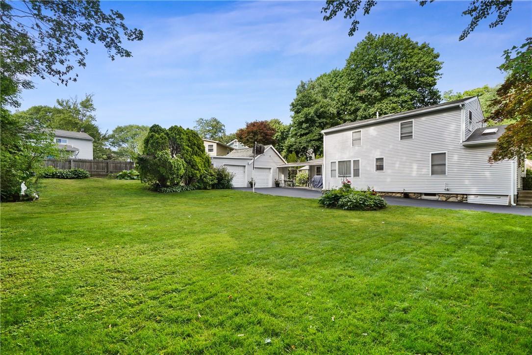 48 Secor Road Mahopac, NY 10541 - Photo 1 of 1 View of yard featuring a garage