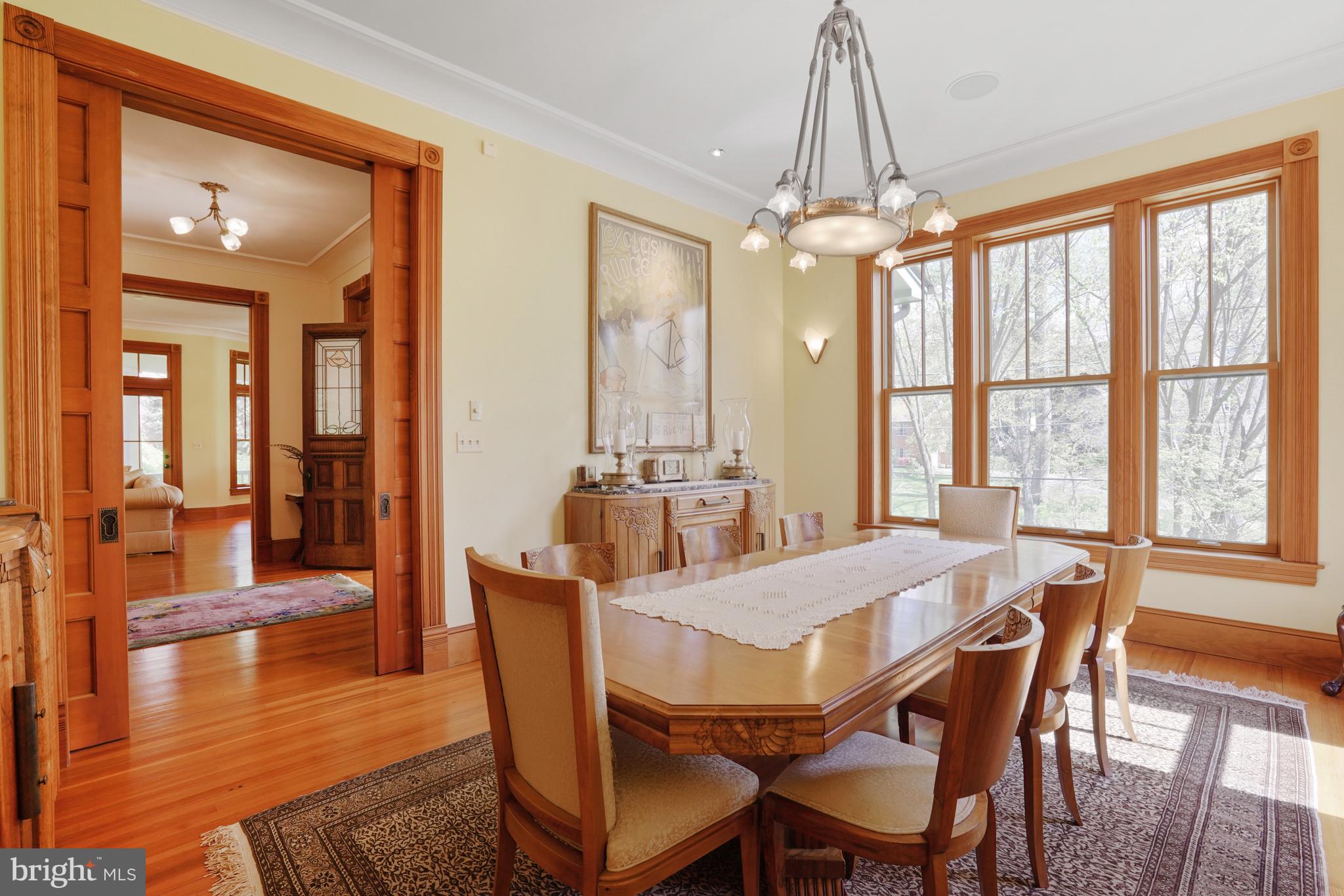 5402 Tuscarawas Road Bethesda, MD 20816 - Photo 13 of 55 a view of a dining room with furniture window and wooden floor