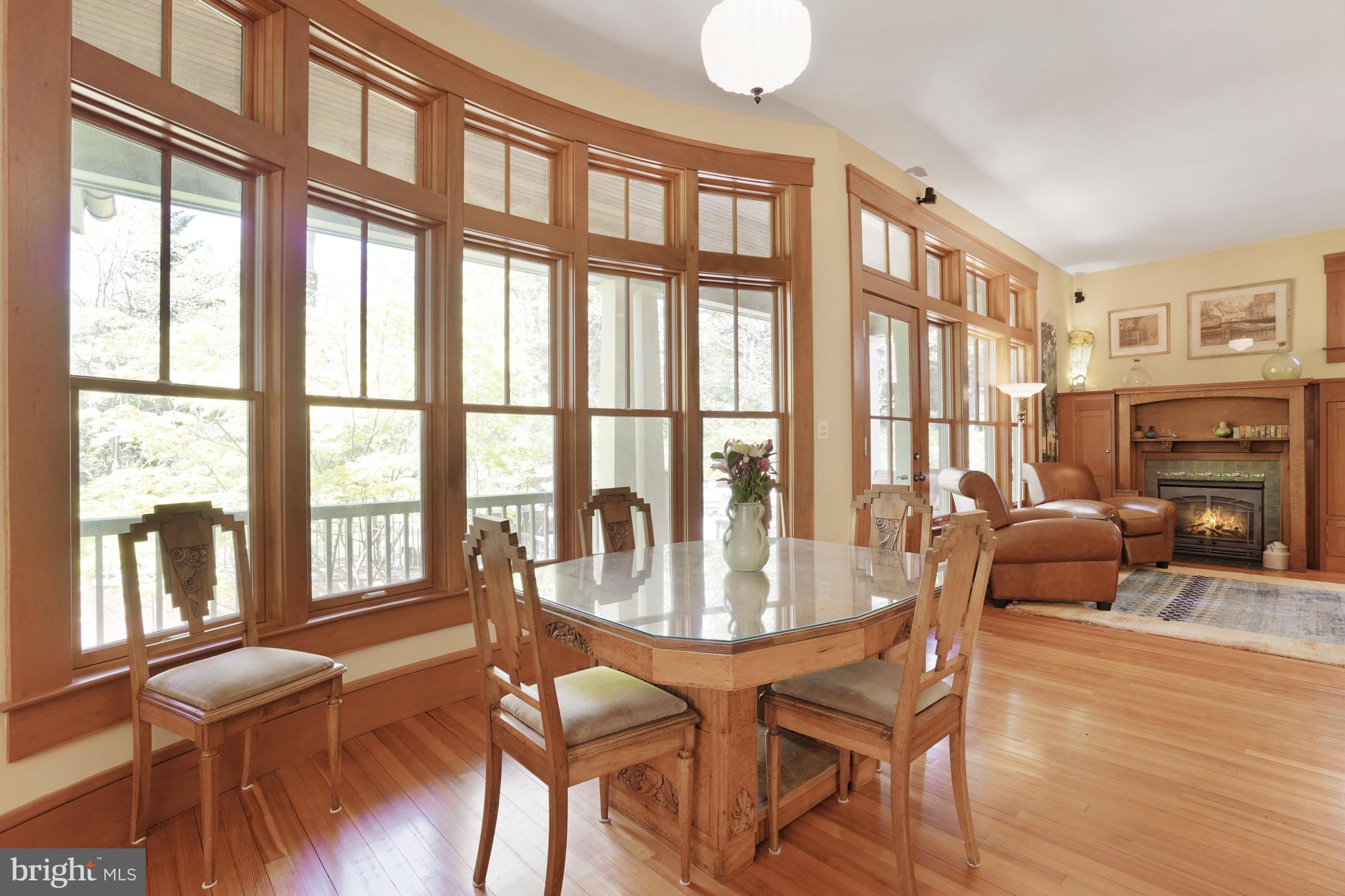 5402 Tuscarawas Road Bethesda, MD 20816 - Photo 19 of 55 a dining room with furniture a livingroom view and wooden floor