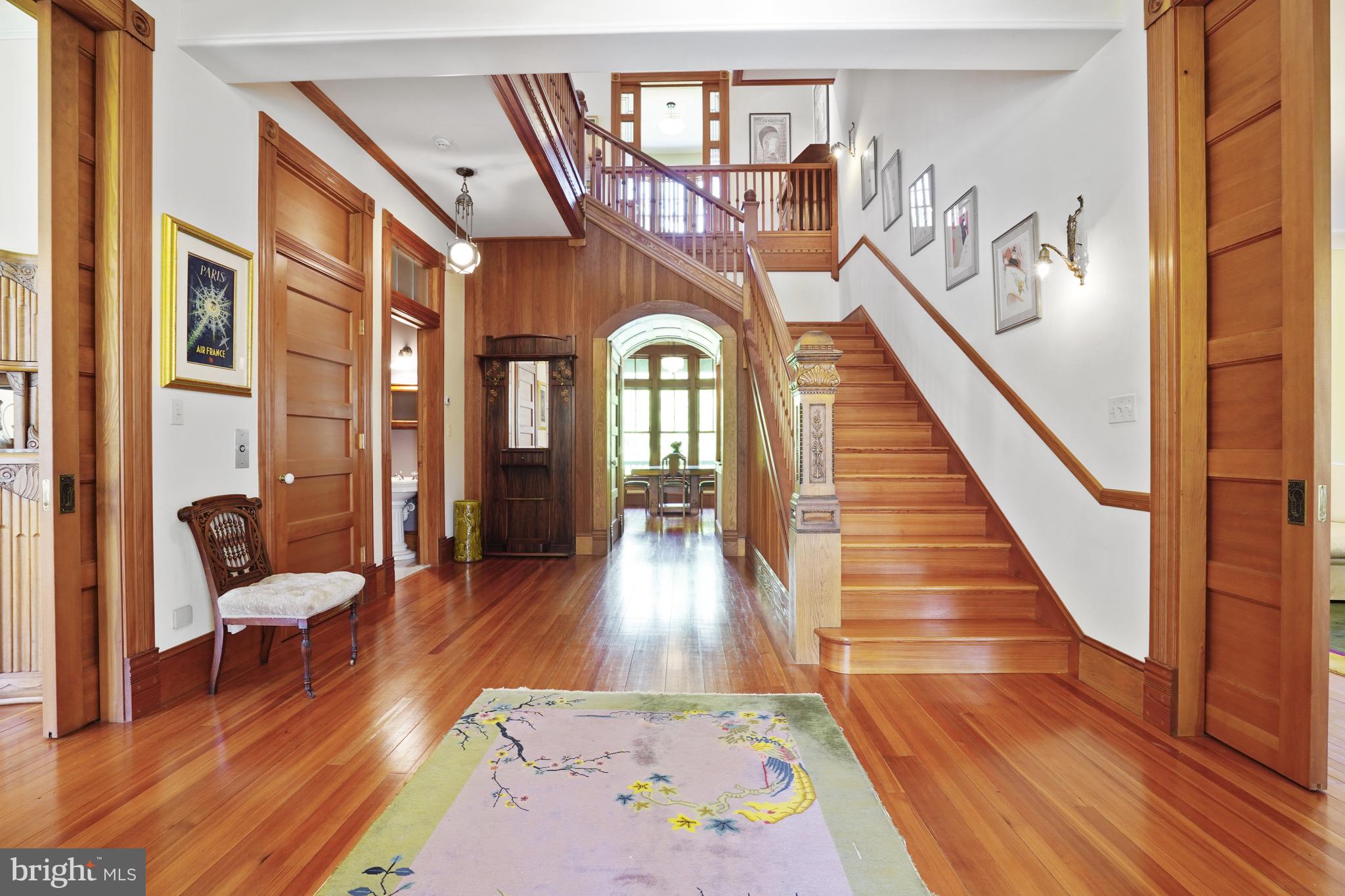 5402 Tuscarawas Road Bethesda, MD 20816 - Photo 3 of 55 a view of an entryway with wooden floor