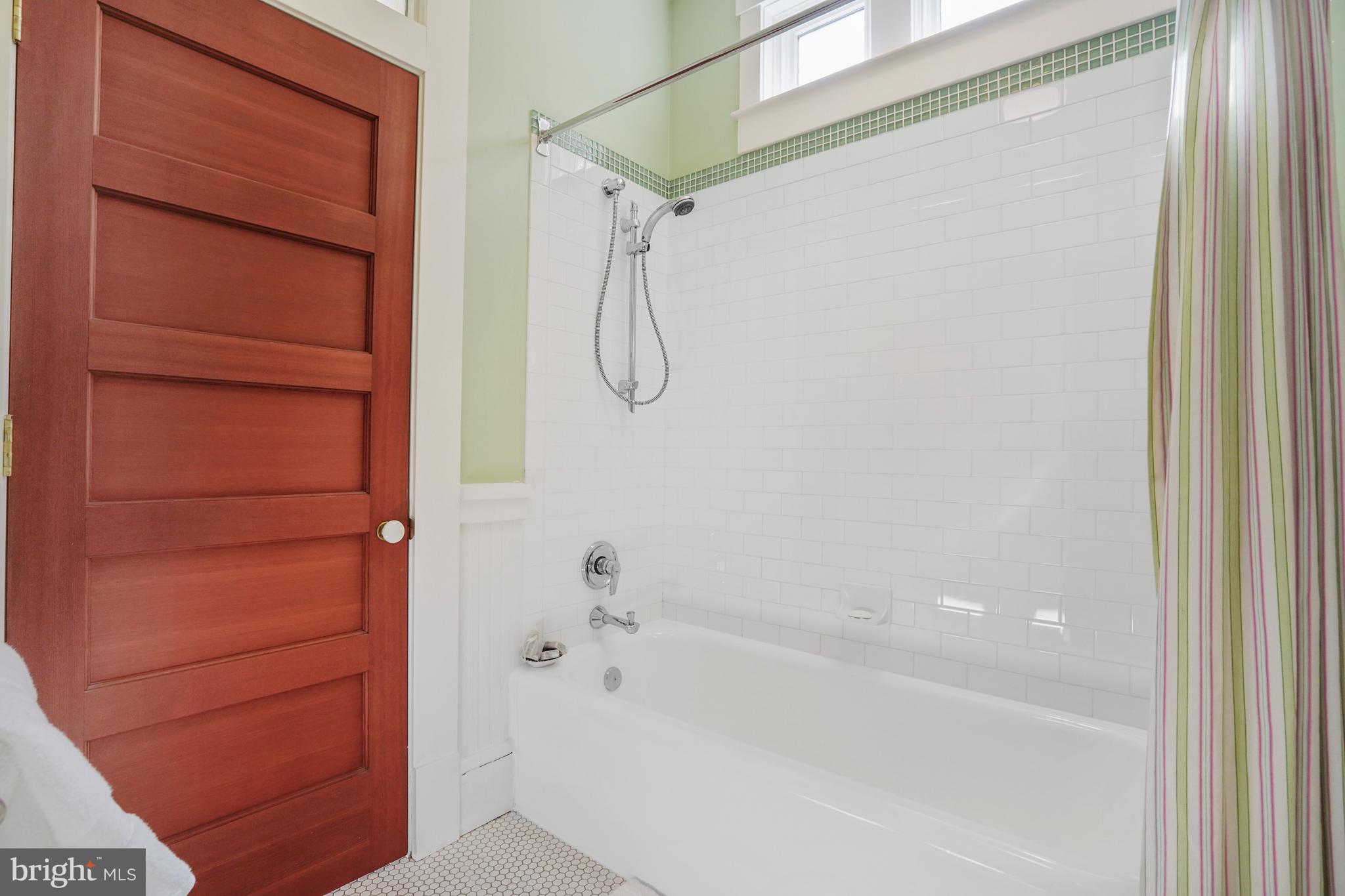 5402 Tuscarawas Road Bethesda, MD 20816 - Photo 36 of 55 a bathroom with a shower