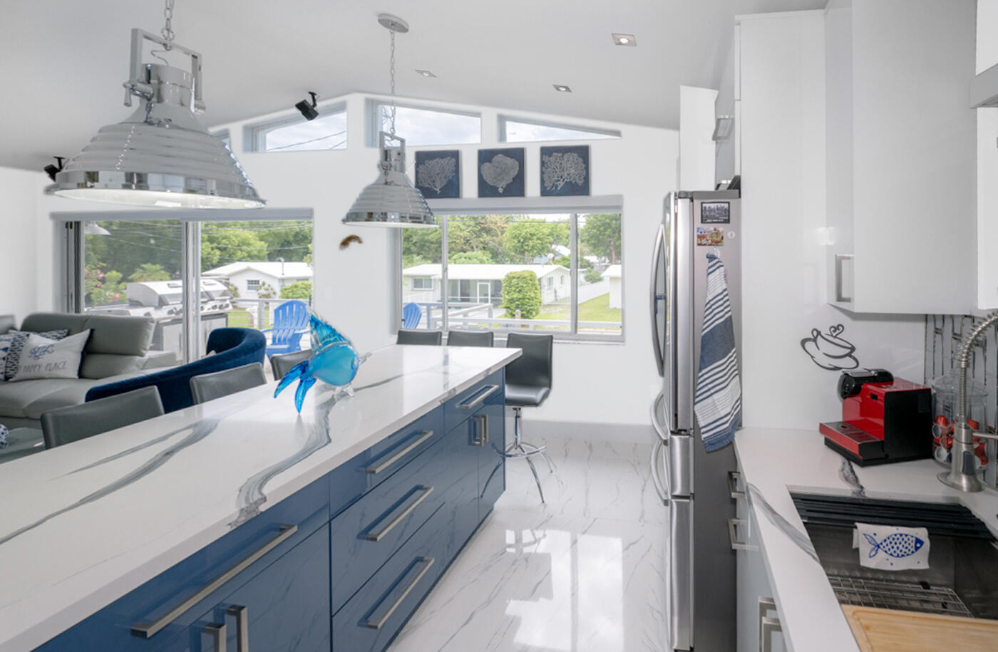 1016 Gibraltar Road Key Largo, FL 33037 - Photo 12 of 39 a kitchen with stainless steel appliances granite countertop a refrigerator and a sink