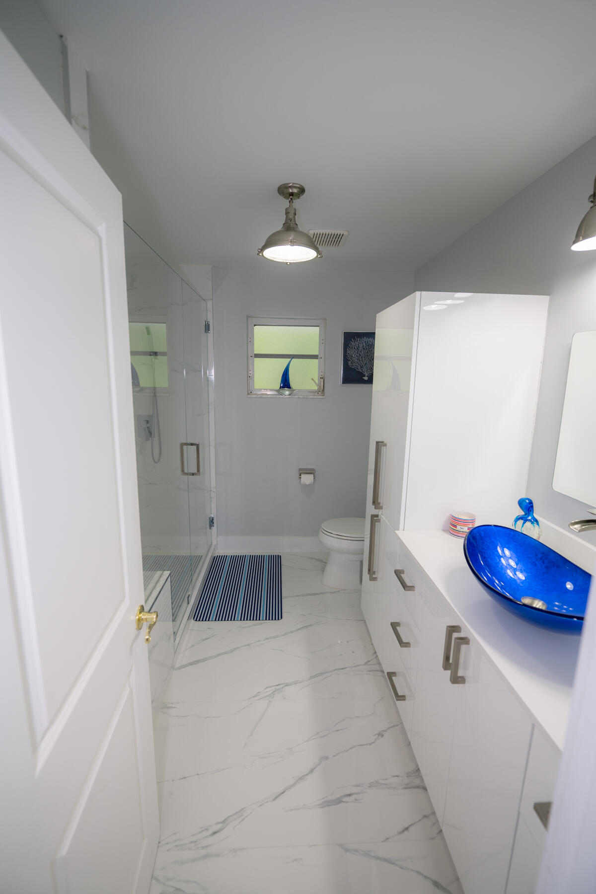 1016 Gibraltar Road Key Largo, FL 33037 - Photo 17 of 39 a view of a kitchen with a sink and refrigerator
