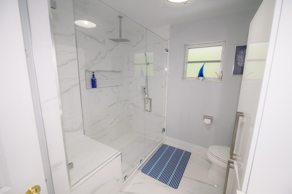 1016 Gibraltar Road Key Largo, FL 33037 - Photo 18 of 39 a bathroom with a sink and a shower