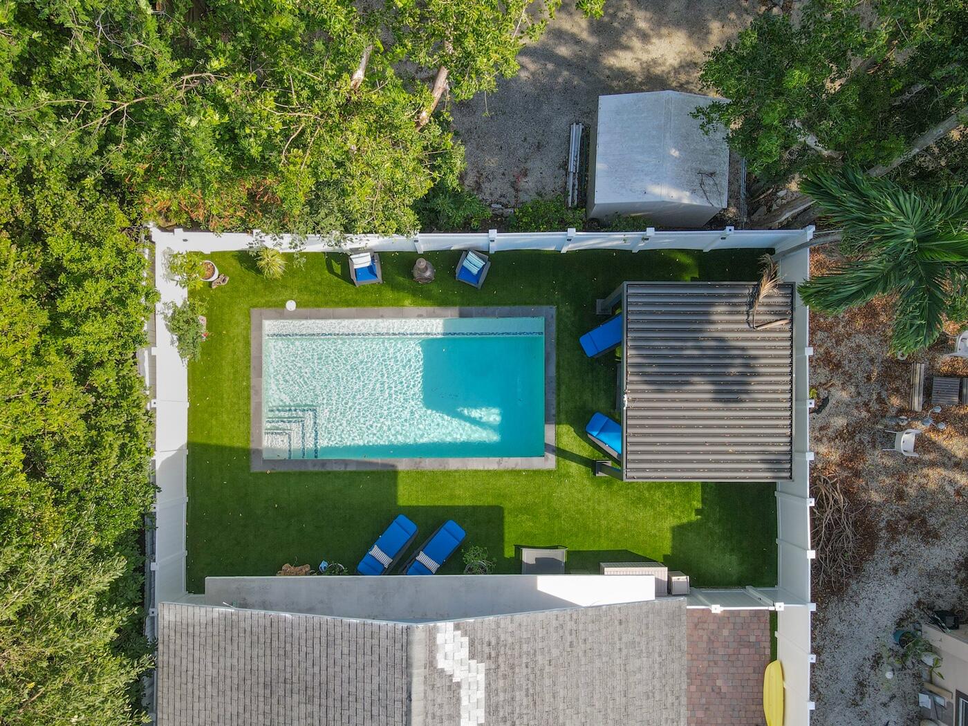 1016 Gibraltar Road Key Largo, FL 33037 - Photo 34 of 39 an aerial view of a house with a yard