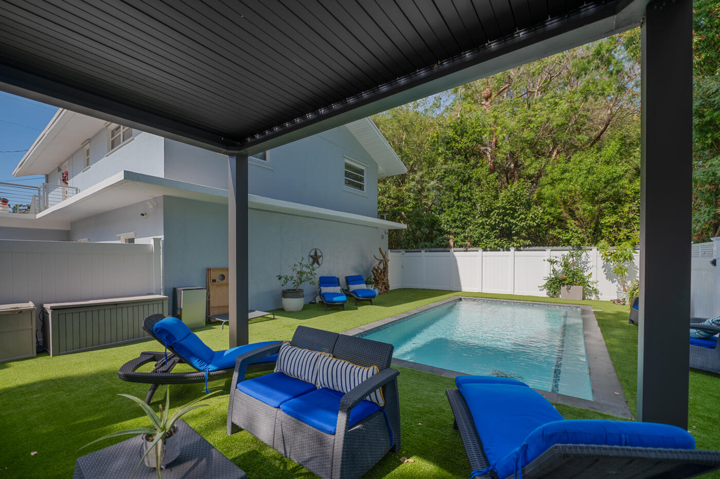 1016 Gibraltar Road Key Largo, FL 33037 - Photo 36 of 39 a view of an chairs and tables in the patio