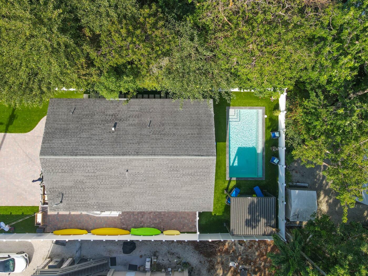 1016 Gibraltar Road Key Largo, FL 33037 - Photo 4 of 39 a view of outdoor space and swimming pool