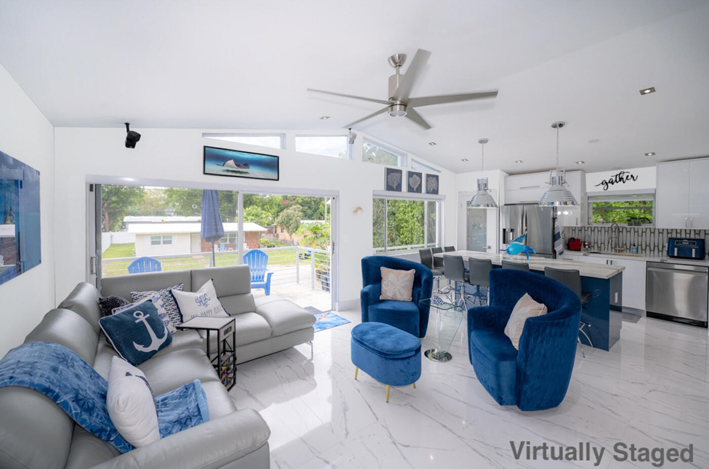 1016 Gibraltar Road Key Largo, FL 33037 - Photo 6 of 39 a living room with furniture and a large window