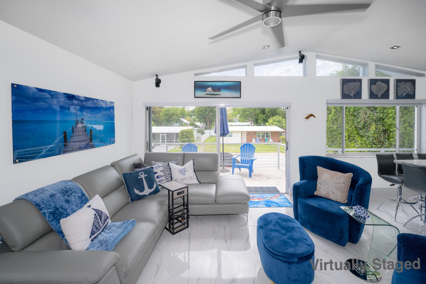1016 Gibraltar Road Key Largo, FL 33037 - Photo 7 of 39 a living room with furniture and a large window