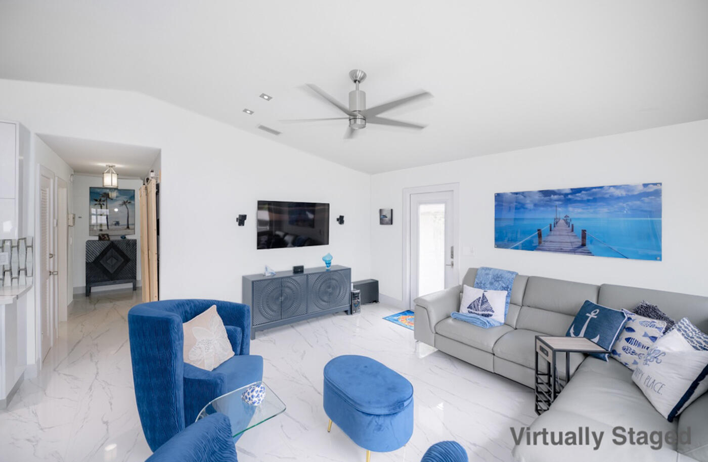 1016 Gibraltar Road Key Largo, FL 33037 - Photo 9 of 39 a living room with furniture a flat screen tv and a couch