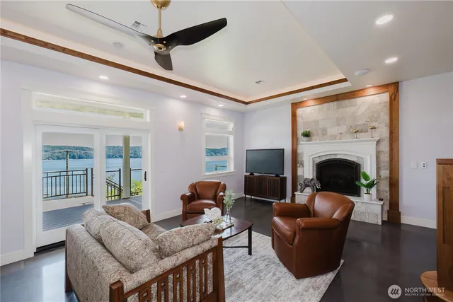 a living room with furniture a fireplace and a fireplace