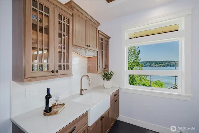 a kitchen with a sink and a window