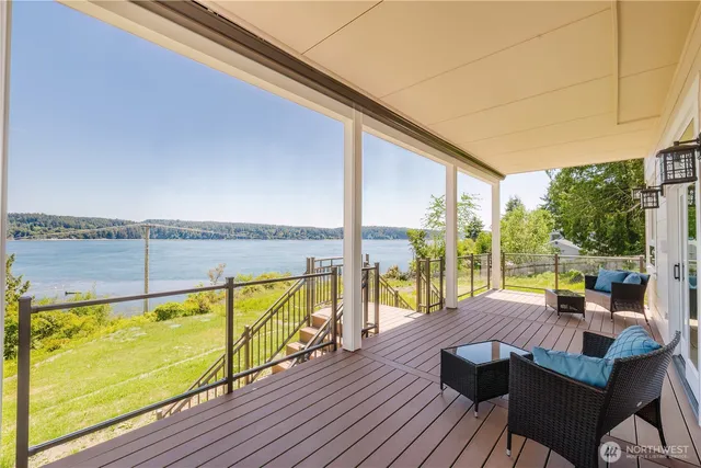 a view of swimming pool with outdoor seating