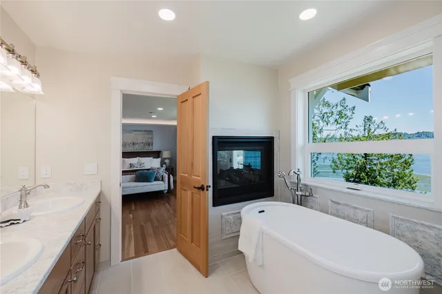 a bathroom with a toilet a sink and a bathtub