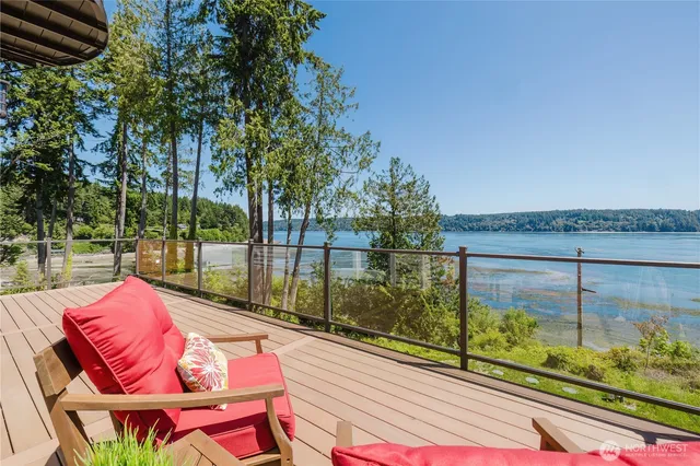 a view of swimming pool with outdoor seating