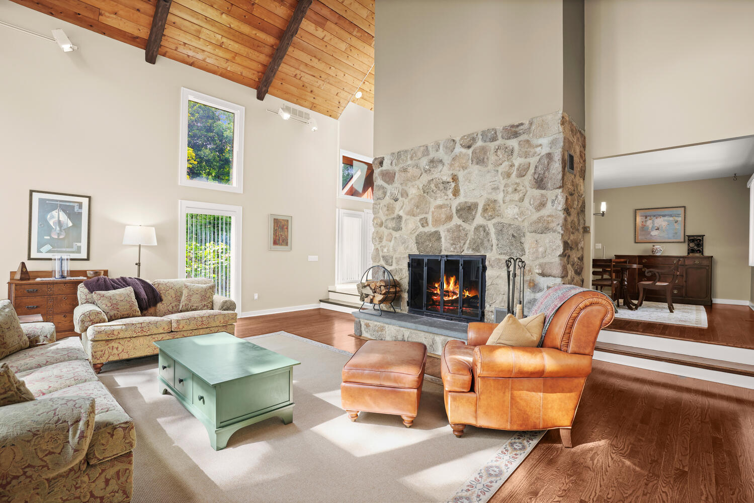 40 Pipers Hill Road Wilton, CT 06897 - Photo 6 of 27 a living room with furniture fireplace and a table