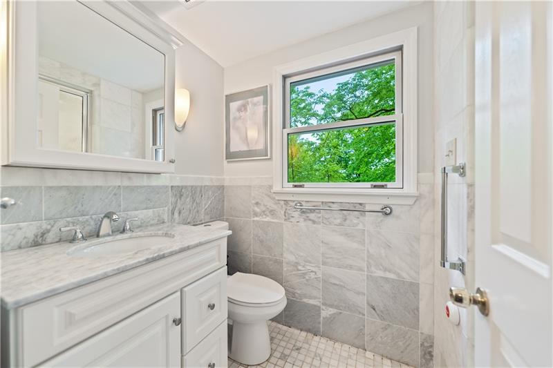 4914 Simmons Circle Export, PA 15632 - Photo 24 of 33 a bathroom with a toilet sink and window