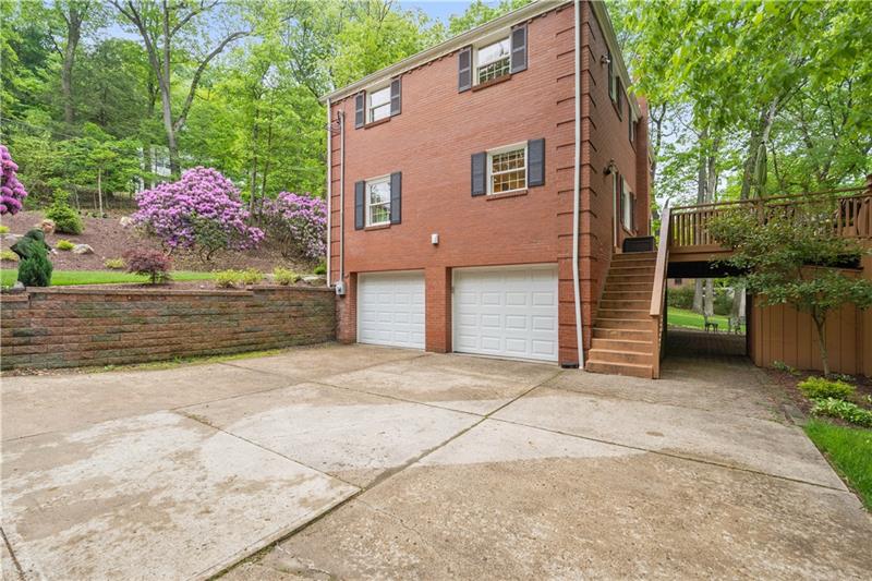 4914 Simmons Circle Export, PA 15632 - Photo 31 of 33 a front view of a house with a yard and garage