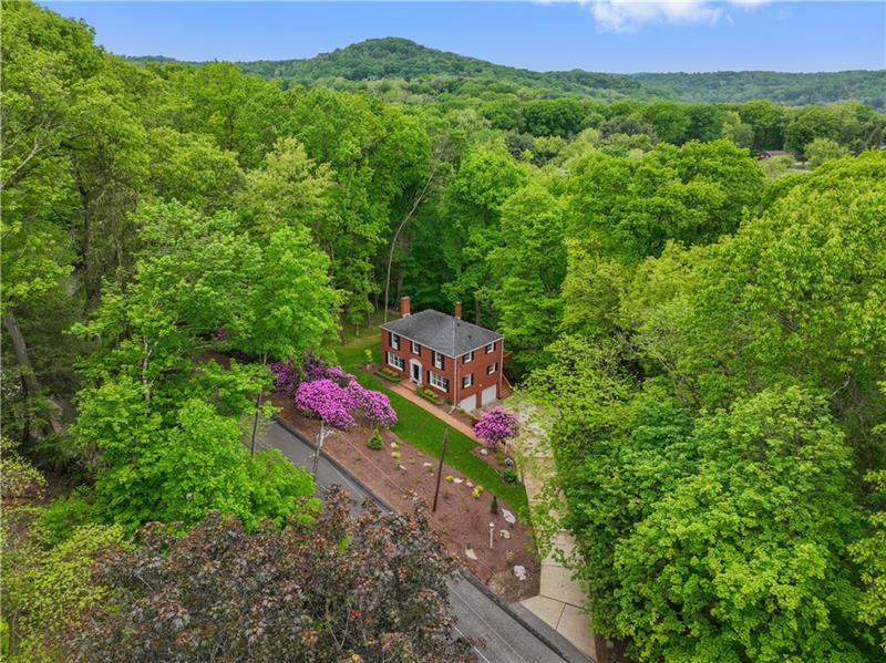 4914 Simmons Circle Export, PA 15632 - Photo 33 of 33 a view of a garden with a building in the background