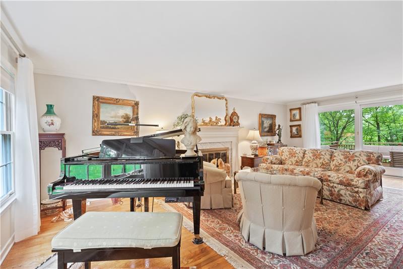 4914 Simmons Circle Export, PA 15632 - Photo 6 of 33 a living room with furniture a flat screen tv and a table