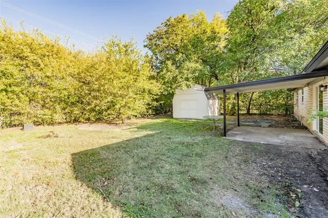 a view of outdoor space and yard