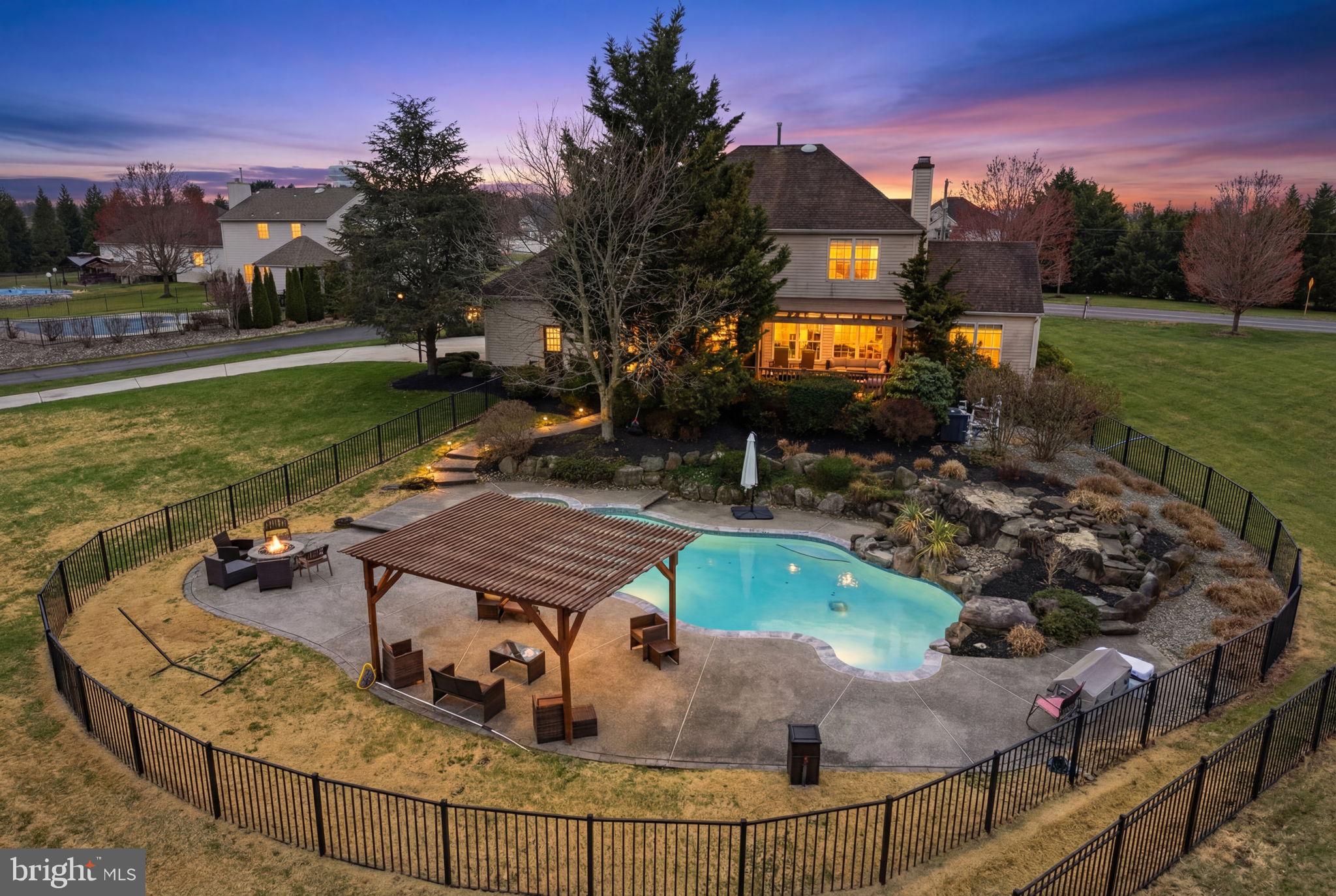 17 Polo Run Mickleton, NJ 08056 - Photo 1 of 66 Serene backyard oasis at twilight.