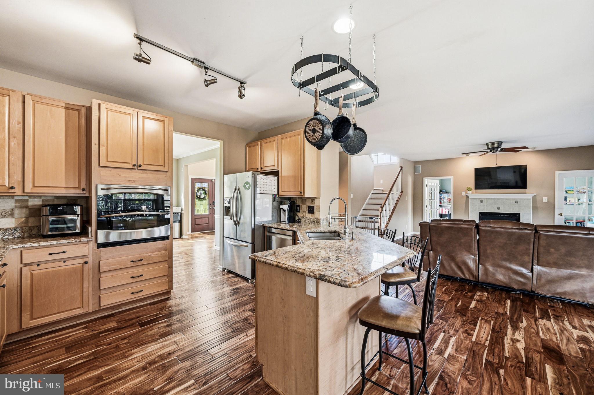 17 Polo Run Mickleton, NJ 08056 - Photo 16 of 66 Modern kitchen with warm wood tones.