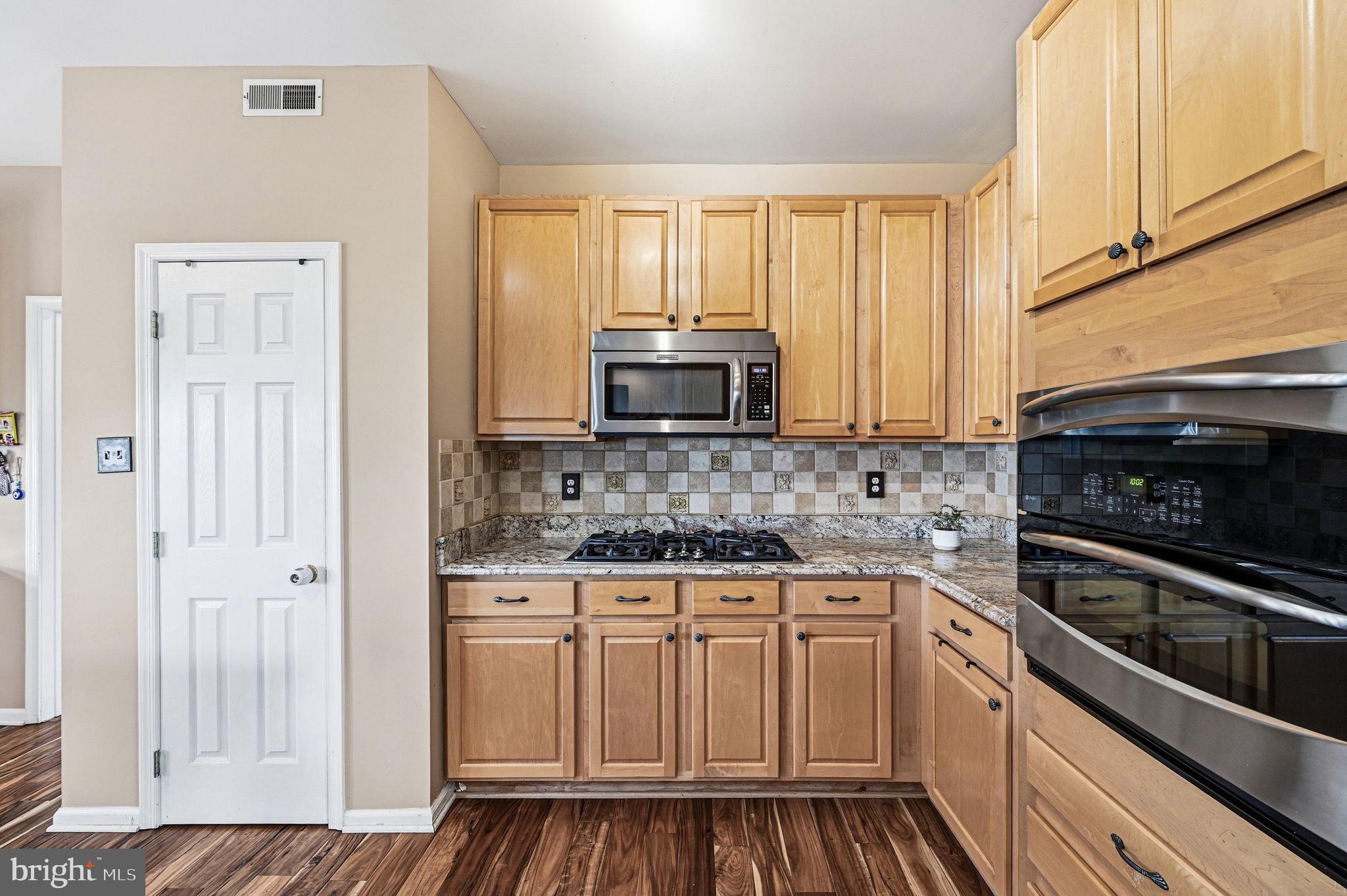 17 Polo Run Mickleton, NJ 08056 - Photo 17 of 66 Modern kitchen with warm wood tones.
