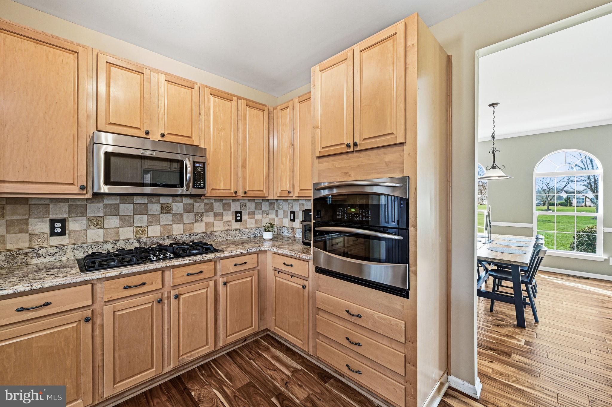 17 Polo Run Mickleton, NJ 08056 - Photo 18 of 66 Modern kitchen with warm wood tones.
