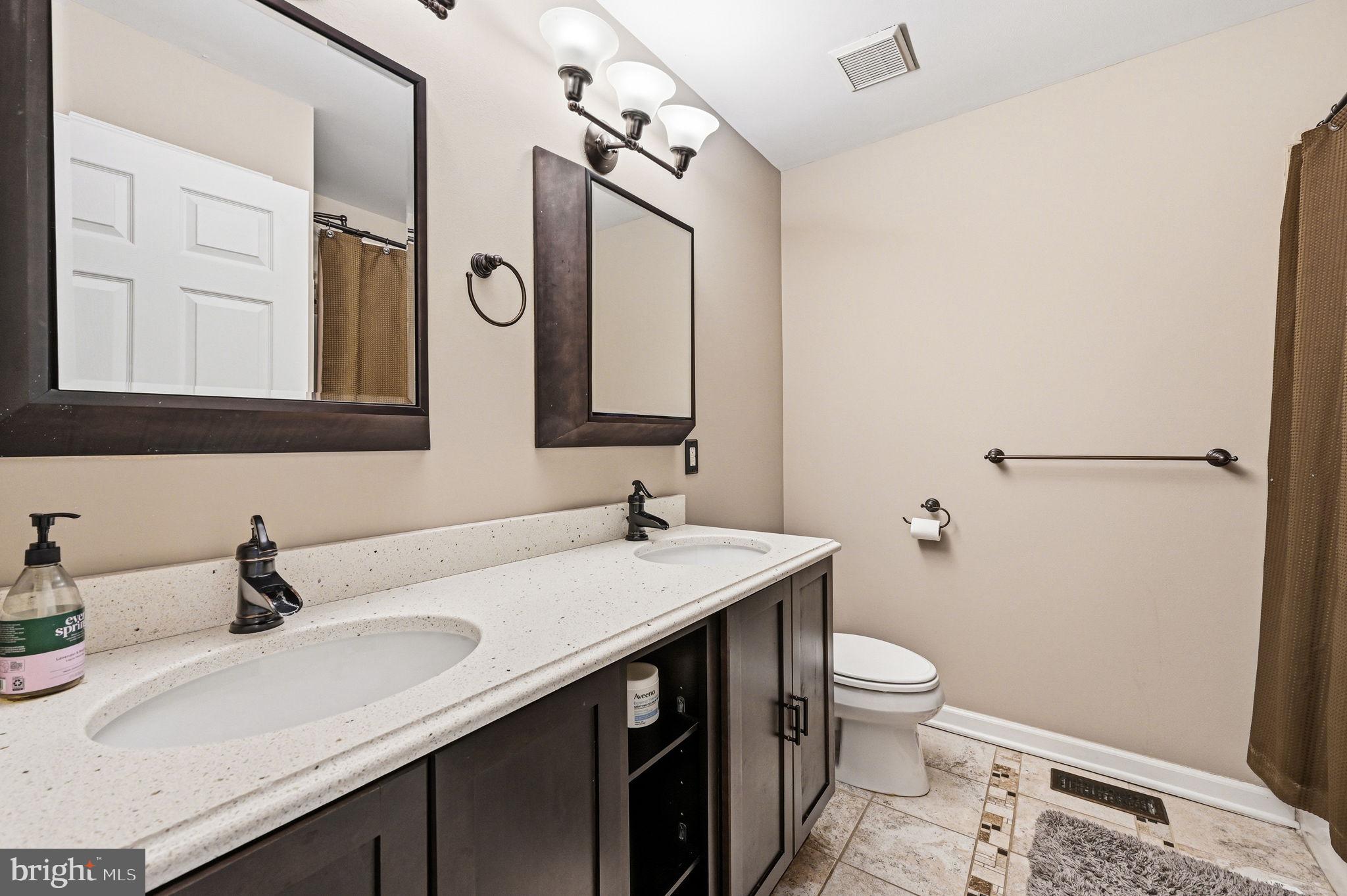 17 Polo Run Mickleton, NJ 08056 - Photo 40 of 66 Modern elegance in a serene bathroom.