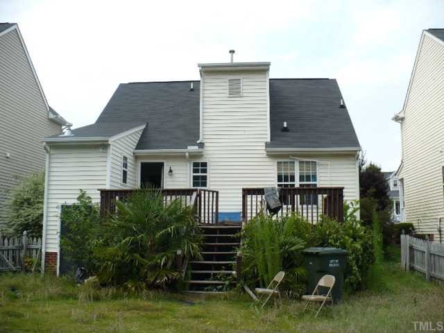 1529 Crag Burn Lane Raleigh, NC 27604 - Photo 2 of 3 a front view of a house with a yard