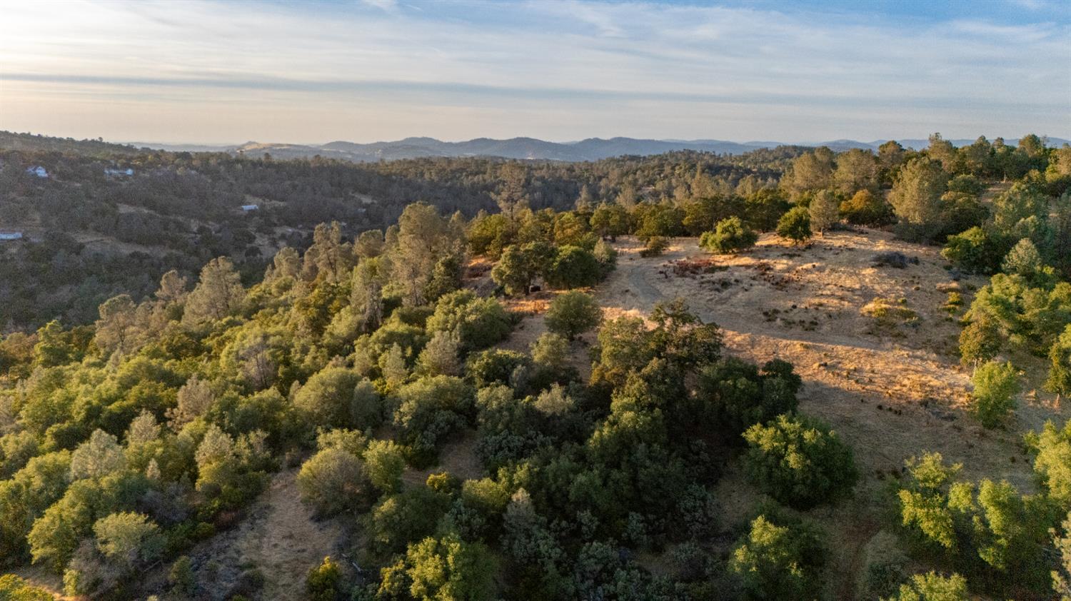 21088 Dalzell Road Smartsville, CA 95977 - Photo 24 of 36 a view of a city with mountains in the background