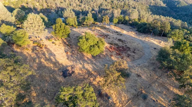a view of a city with mountains in the background