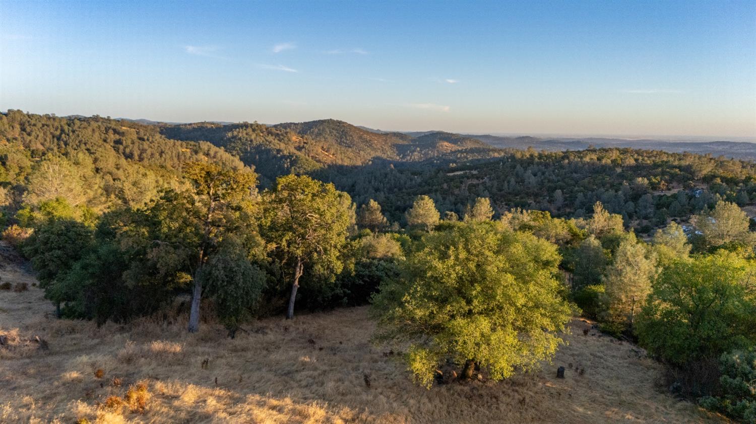 21088 Dalzell Road Smartsville, CA 95977 - Photo 28 of 36 a view of a city with mountains in the background
