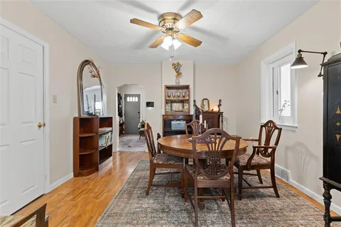 a view of a dining room with furniture