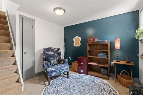 a view of a livingroom with furniture