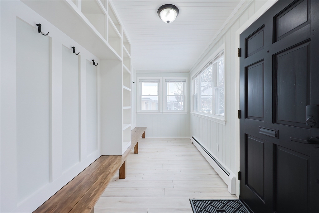19 Arlington Road Waltham, MA 02453 - Photo 5 of 40 a view of a room with windows