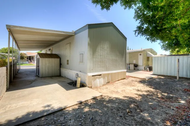 a view of a balcony with wooden floor