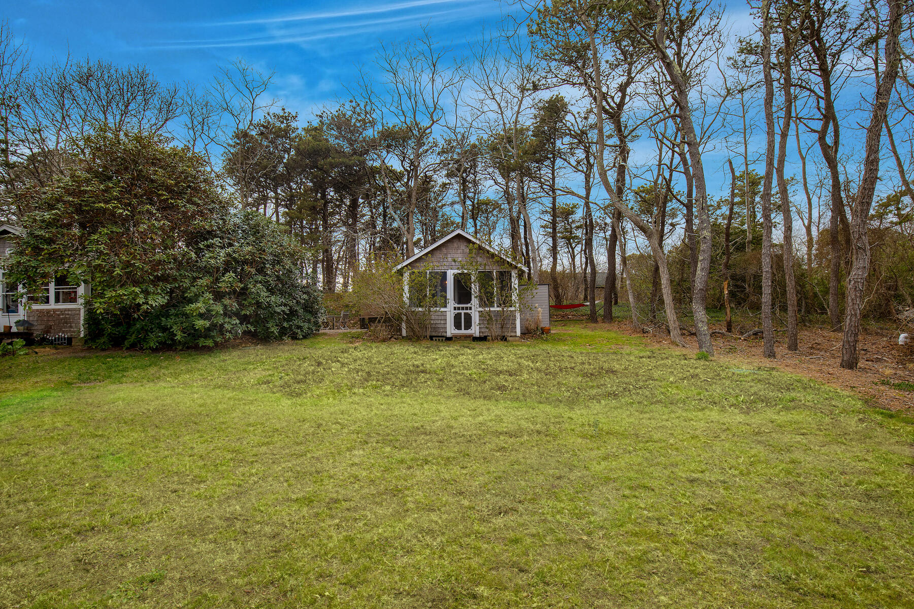 82 Shore Road, Unit 9 Truro, MA 02666 - Photo 29 of 36 a house view with a garden space