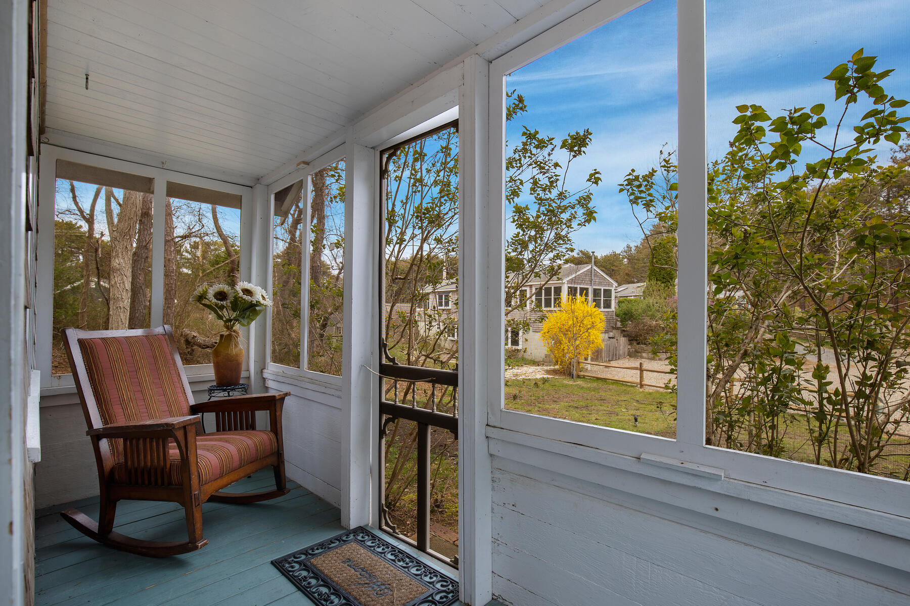 82 Shore Road, Unit 9 Truro, MA 02666 - Photo 7 of 36 a room with furniture and a potted plant