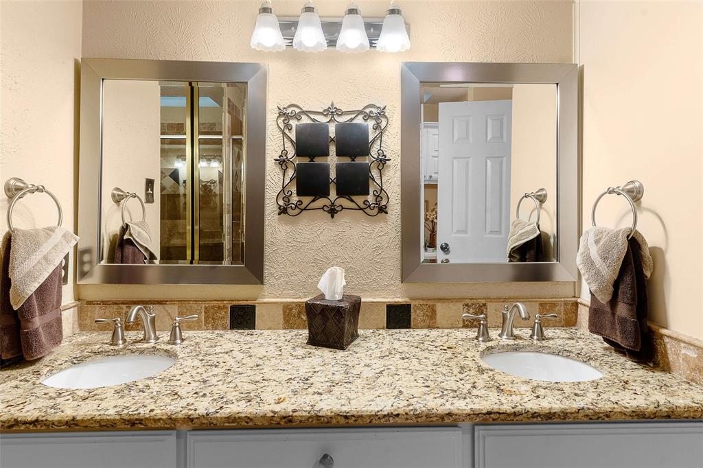 14683 Plage Lane Addison, TX 75001 - Photo 14 of 39 Full bath with double vanity and a textured wall