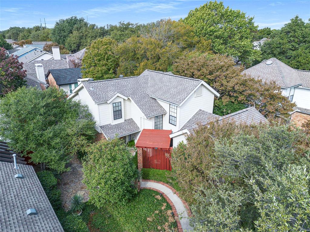 14683 Plage Lane Addison, TX 75001 - Photo 2 of 39 View from above of property featuring a tree filled landscape