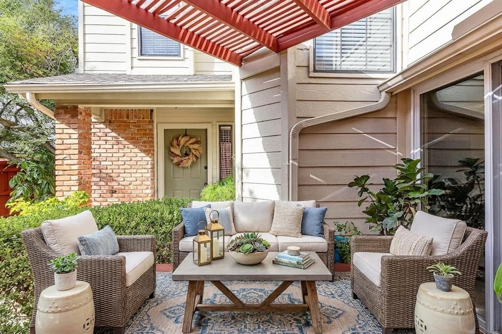 14683 Plage Lane Addison, TX 75001 - Photo 25 of 39 Virtual stagged patio featuring an outdoor hangout area and a pergola