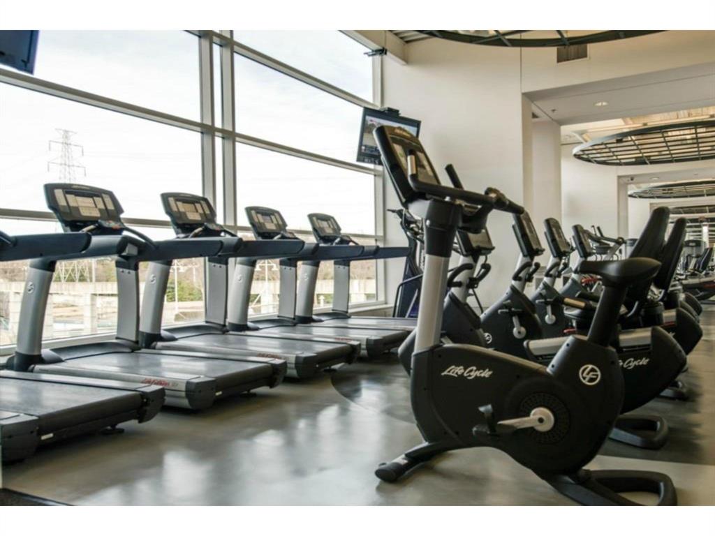 14683 Plage Lane Addison, TX 75001 - Photo 35 of 39 Gym with expansive windows